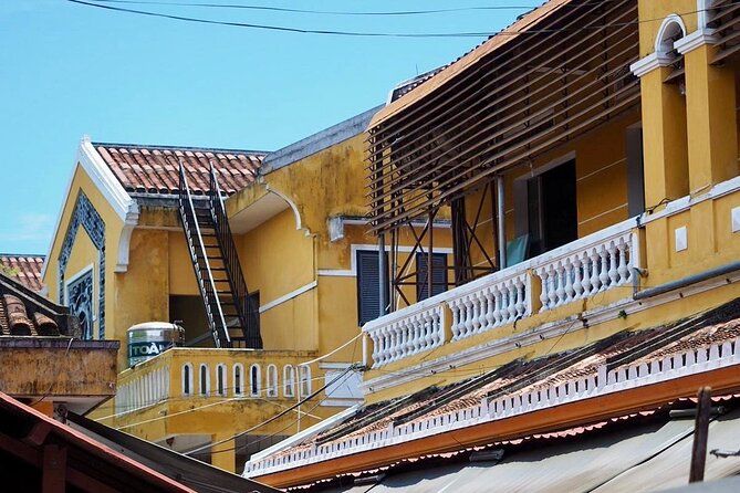 Hoi An Ancient Town Walking Tour with a Local - Stop 3: Cantonese Assembly Hall and the community behind the colors