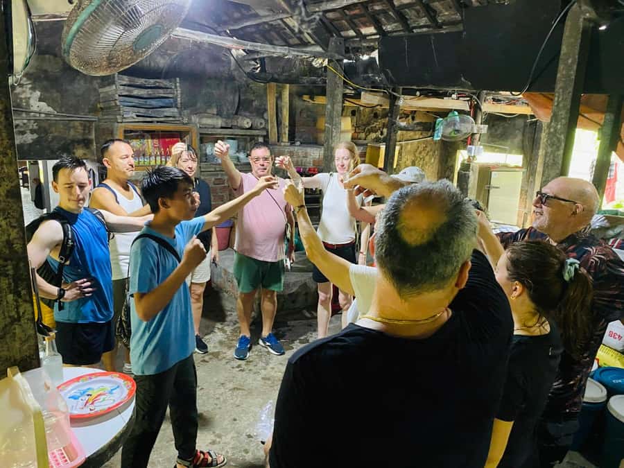 Hoi An Countryside Bike Tour- Tra Que Village & Basket Boat - Duyen Hai Nam Trung: Rice Wine Tasting and the Story Behind Happy Water