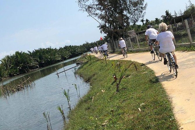 Hoi An Countryside - Buffalo Riding - Basket Boat Rowing - Tra Que Vegetable Village: where the day starts slow and real