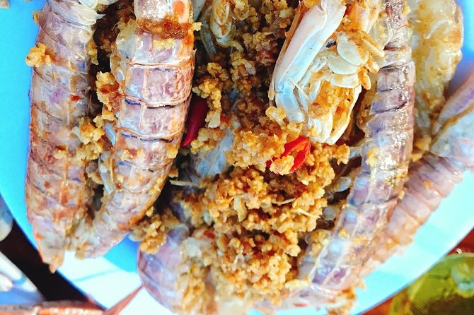 Hoi An Nightlife And Food Tour By Electric Scooter - Karaoke Center: Vietnamese Nightlife in Full Volume