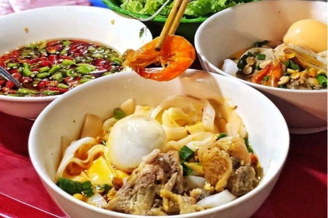 Hoi An Street Food Tour- The Real Taste Of Hoi An - Stop 3: Mr. Hai noodles (Mì Quảng Ông Hai) for the Quảng flavor