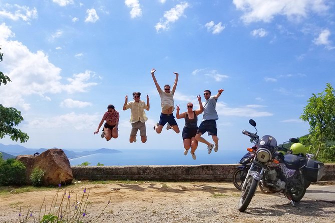 Hoi An to Hue via Hai Van pass and waterfall - Dragon Bridge: a quick Da Nang signature stop