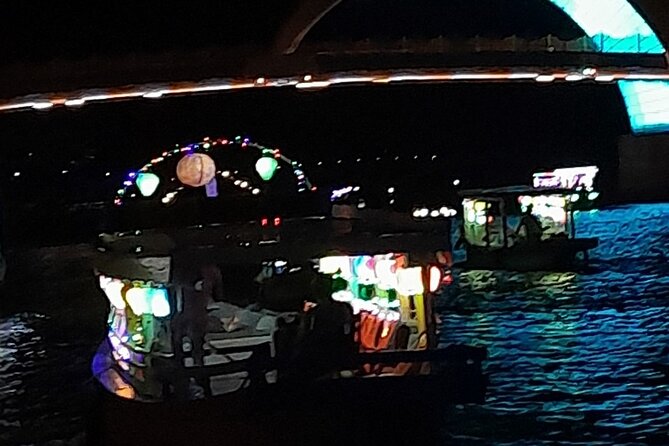HoiAn Small Boat By Night on Bach Dang River - The night option: lantern prayers on the Bach Dang River