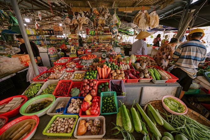 HoiAnGO Experience Local Life: Countryside by Electric Car - Ba Le Market stop: how your guide turns produce into a story