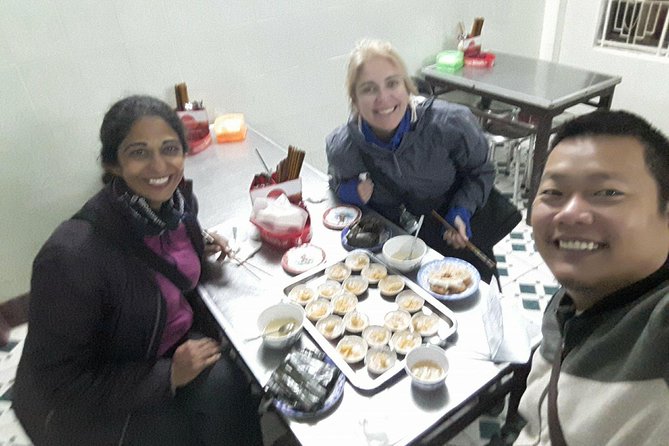 Hue Food Tour by Walking or Cyclo or Motorbike with Driver - Stop 3: Trang Tiên Bridge bites and Hue classics