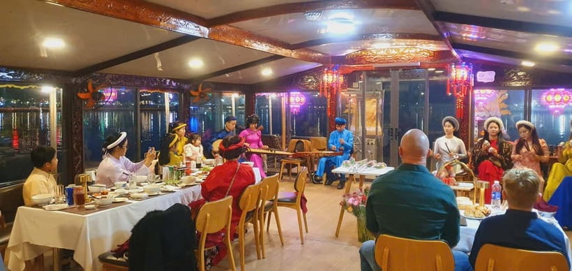 Hue: Perfume River Dinner Cruise with Traditional Show - Traditional Hue costumes: fun photos, and it actually lasts