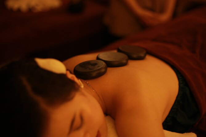 Hue Royal Relaxation Body Massage for 110 mins - The main treatment: Hue White Lotus Candle Massage with hot stones