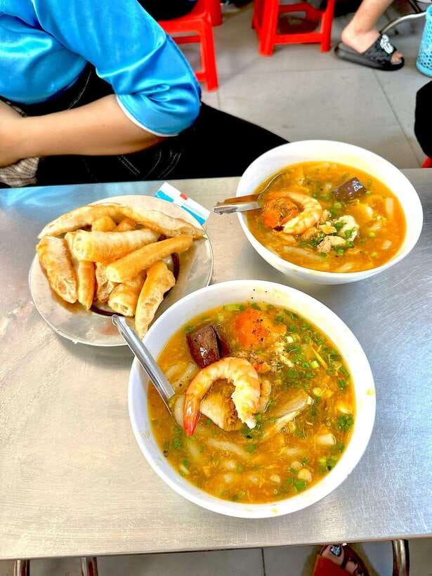 KISSTOUR | Motorbike Food Tour Female Drivers in Ho Chi Minh - What You’ll Eat: Noodles, Crepes, Betel Wraps, and Mud Creepers