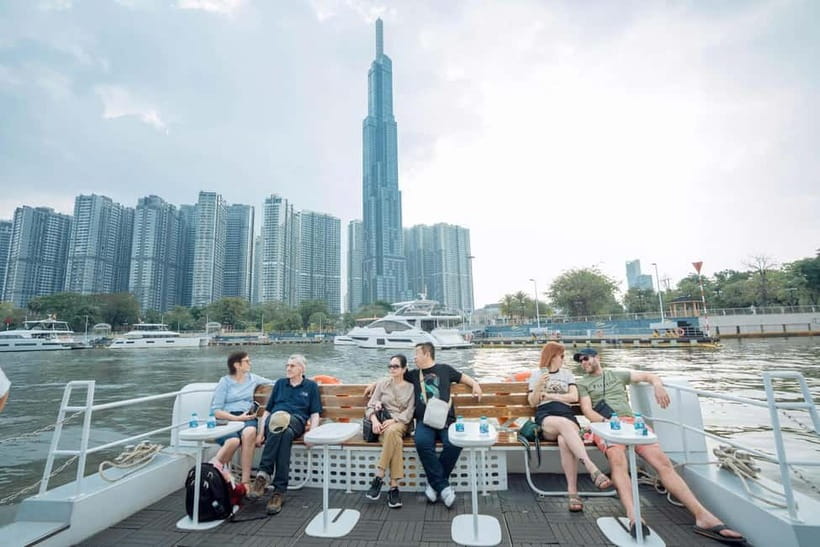 Lively Saigon River Sightseeing Cruise + Guided Walking Tour - On board vibe: music, ice cream, and how not to get annoyed