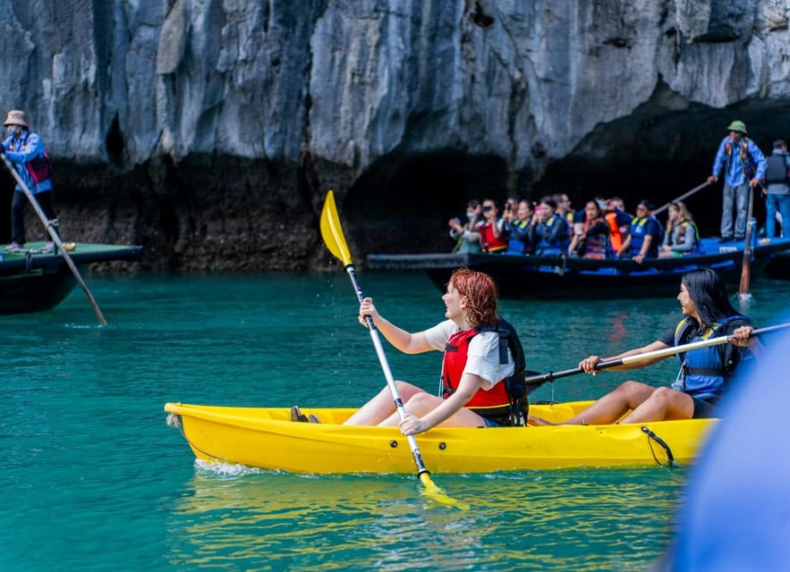 Luxury Ha Long Symphony Day Cruise With Lunch, Cave & Island - Luon Cave on the water: rowboat or kayak time, plus the blue-water payoff