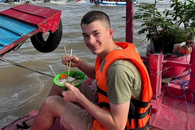 Mekong 2-Day Tour Floating Market-Bird Sanctuary-Flower Village - Cai Rang floating market: breakfast, hu tieu, and fruit-on-boat vibes
