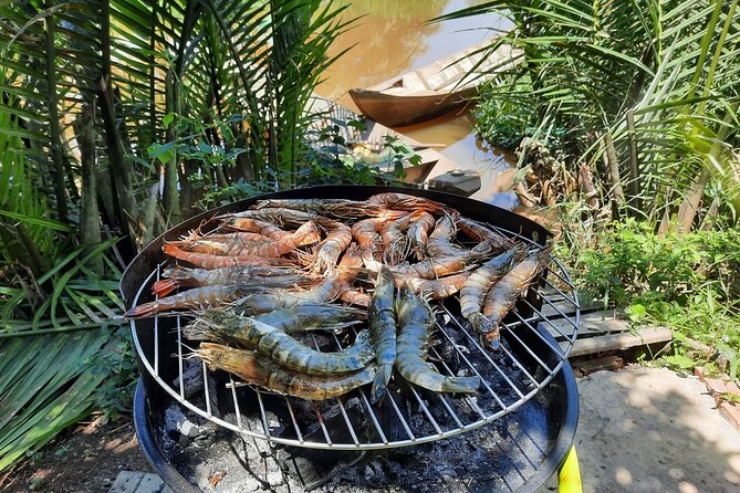 Mekong 2 Days 1 Night SMALL GROUP Stay at Family Tiny Homestay WITH BBQ DINNER - Homestay in the family tiny garden: BBQ dinner, sunset rice fields, and a chance to join in