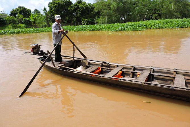 Mekong Delta Tour with Cooking and Kayaking - Town on foot, then motorized boat: shifting from city to waterways