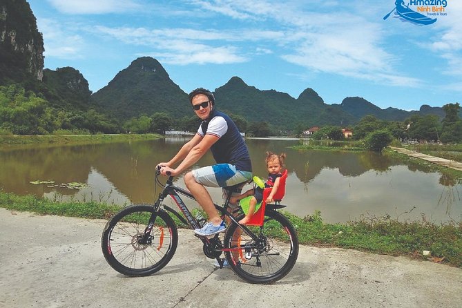 Mua Cave - Tam Coc - Bich Dong Day tour with transfer, local family & bike - Mua Cave: The Tran Legend and the Vietnamese Great Wall of China