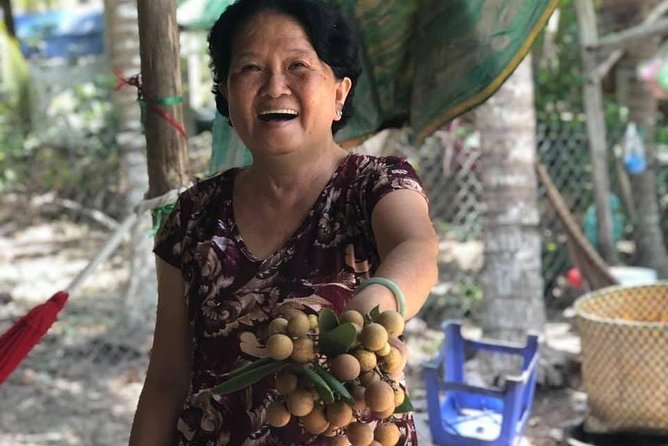 My Tho - Mekong Delta One Day Guided Trip Best Excursion HCM City - Stop 1 in My Tho: fruit gardens, honey, coconut candy, and the river rhythm