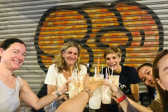 Night Food Tour in Saigon By Scooter - Scooter safety, rain ponchos, and how to dress for the ride