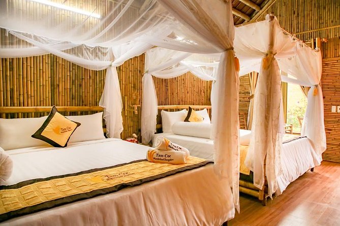 Ninh Binh 2 days 1 night in Bungalow: Hoa Lu-Mua Cave -Tam Coc-Bike-Cuc Phuong - Tam Coc sampan cruise: three cave passes that feel like a reset