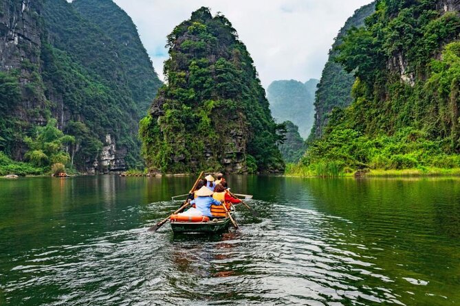 Ninh Binh full day-Hoa Lu temple & biking, Tam Coc boat trip, Dragon mountain - Tam Coc-Bich Dong boat trip: the caves-and-rice-field highlight