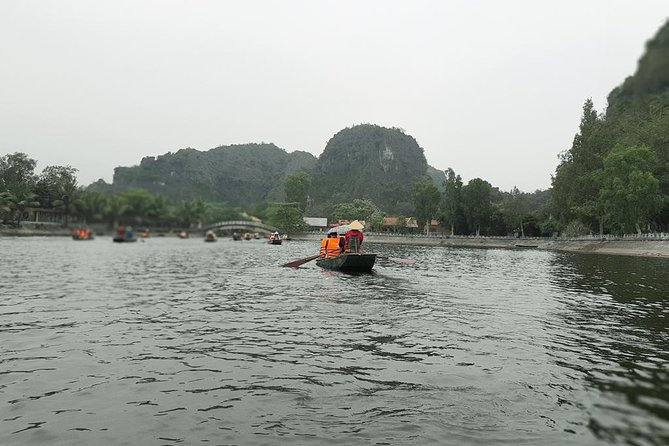 Ninh Binh Full-Day Tour from Hanoi to Hoa Lu, Tam Coc & Mua Cave Via Boat & Bike - Practical Tips: What to Bring and How to Handle Steps and Crowds