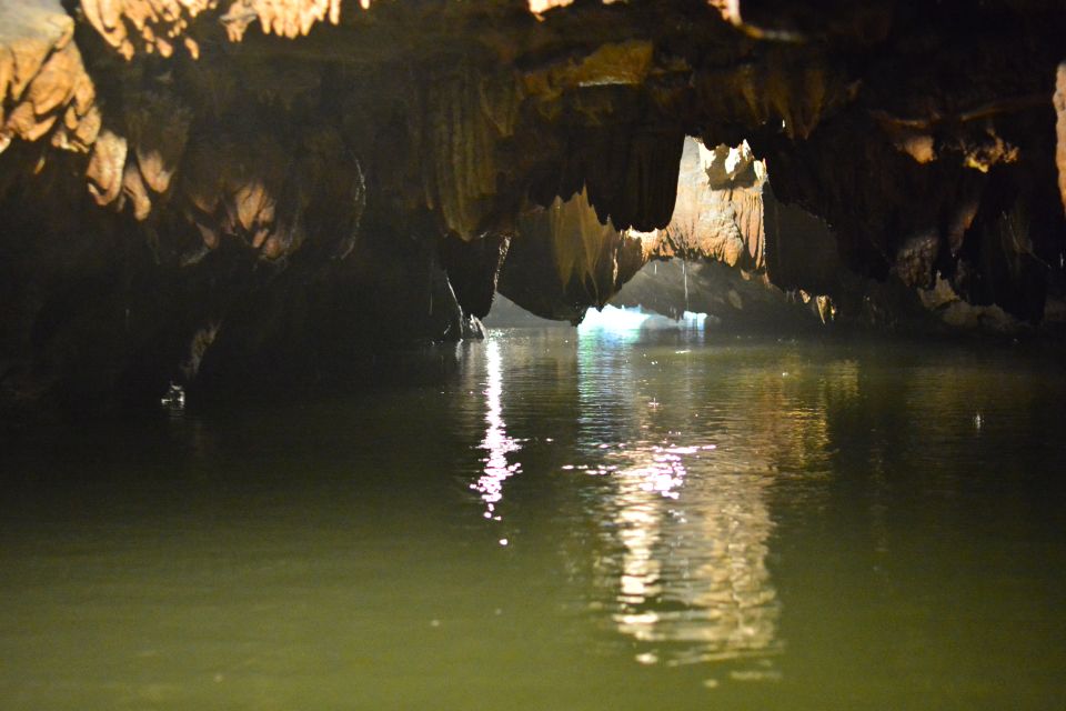 Ninh Binh: Hoa Lu, Mua Cave, and Trang An Tour and Boat Ride - Trang An sampan ride: caves, emerald water, and a slow-motion finale