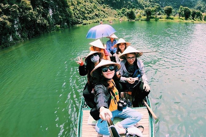 Ninh Binh Tour: Deluxe & Small Group Tam Coc Hoa Lu - Boat, Biking, Buffet Lunch - Tam Coc River boat ride and the flooded cave experience
