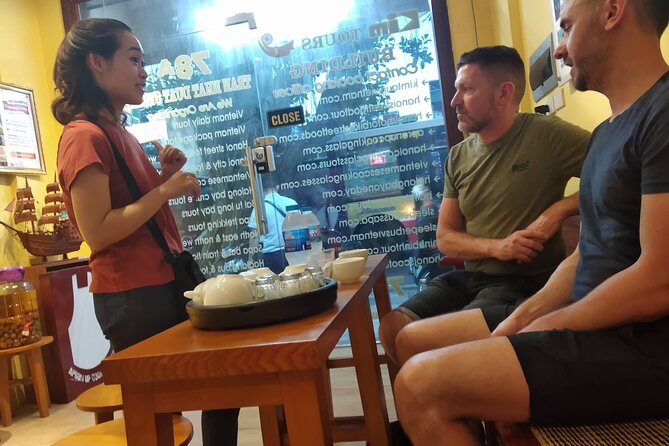 Old Quarter Hanoi Street Foods and Heritage Road Tour by Walking - Old Quarter time with O Quan Chuong Gate and multiple vendors