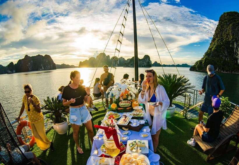 Optional Halong Bay Day Cruise with Caves, Islands & Lunch - Getting on board: check-in, a welcome drink, and how the day flows