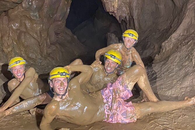Paradise Cave & Dark Cave 1 Day - Deluxe Small Group - Hang Tối (Dark Cave): helmet lights, zipline river runs, cave swimming, and mud baths