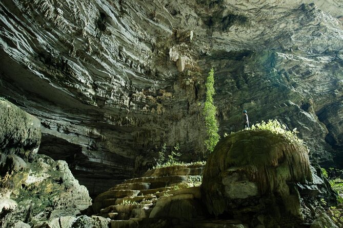 Paradise Cave & Dark Cave Full Day Trip - Getting picked up, staying in a small group, and using the mobile ticket