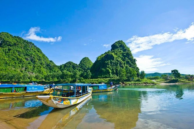 Paradise Cave & Dark Cave Full Day Trip - Dark Cave at 1:30 pm: kayak crossing, helmet-lit walking, and mud baths