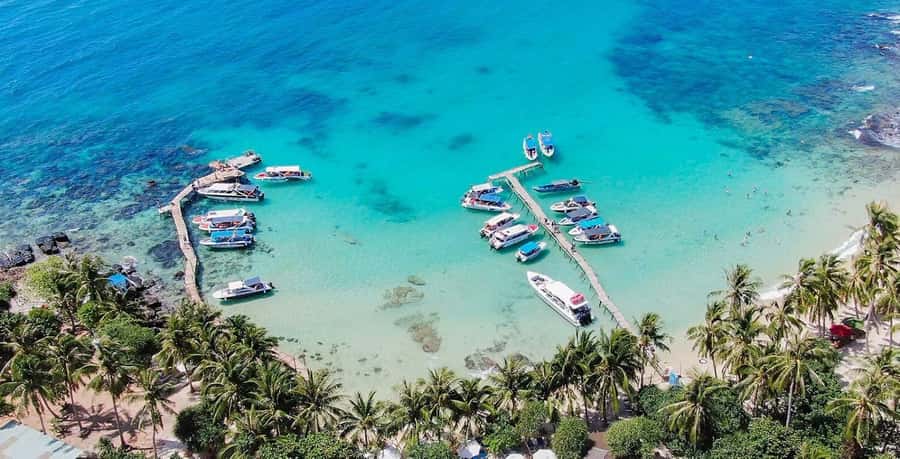 Phu Quoc: 3-Island Tour & Cruise with Lunch & Water Sports - Hon May Rut Ngoai: beaches, swimming, and photo-ready water