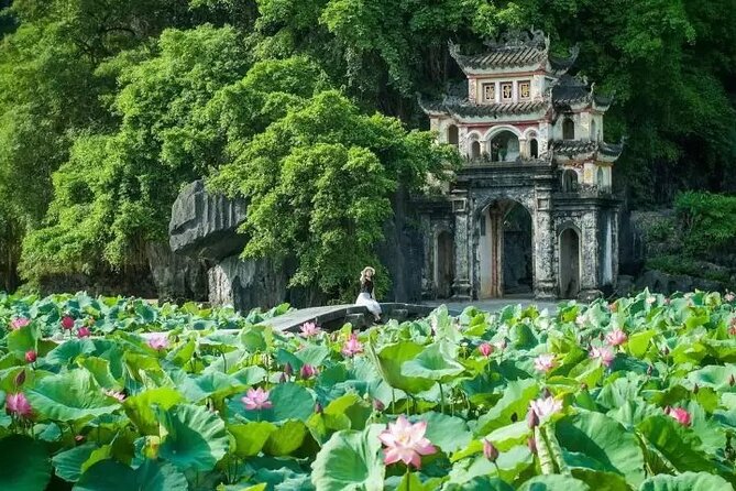 Private Boat and Biking Tour in Ninh Binh (Trang An - Hang Mua) - Trang An grottoes by rowed sampan: Sao Khe River caves and King Kong film set stops