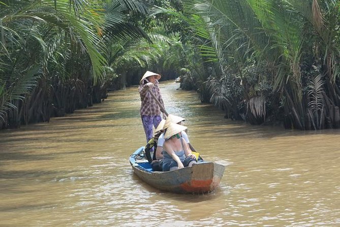 Private Cu Chi Tunnels and Mekong Delta: Full-Day Guided Tour - Cu Chi Tunnels: Film, Traps, Rice Paper, and the Underground Maze