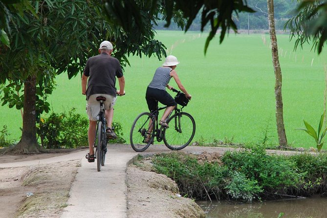 PRIVATE LUXURY Mekong 1 Day with Biking, Fishing, Cooking Class & BBQ LUNCH - Biking in the countryside: fun, but not for the faint-hearted
