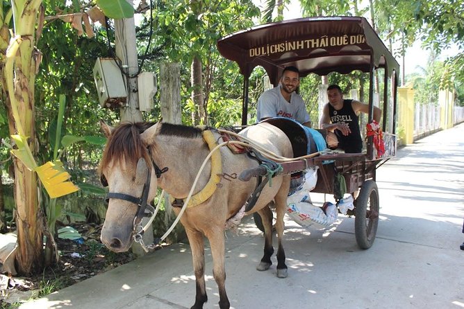 Private Mekong Delta Tour – Boat Ride & Local Lunch - Coconut island and village-style stops for snacks and small culture
