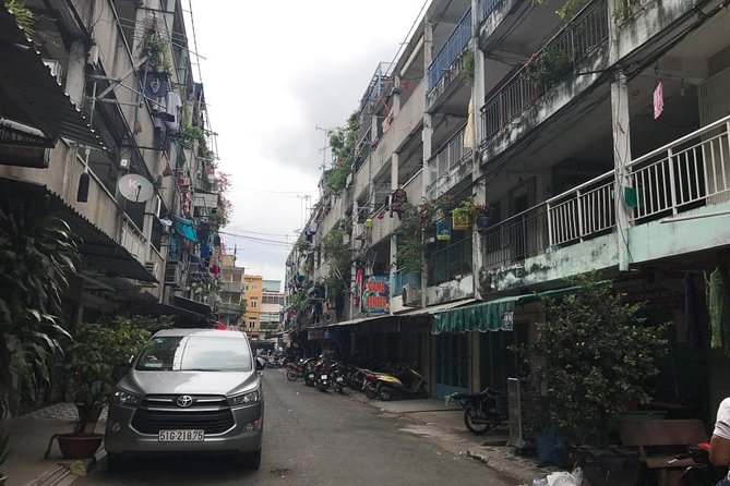 Private Saigon Unseen Tour by Scooter - Ten Thousand Buddha Pagoda, Cao Dai Temple, and Hoa Binh Market