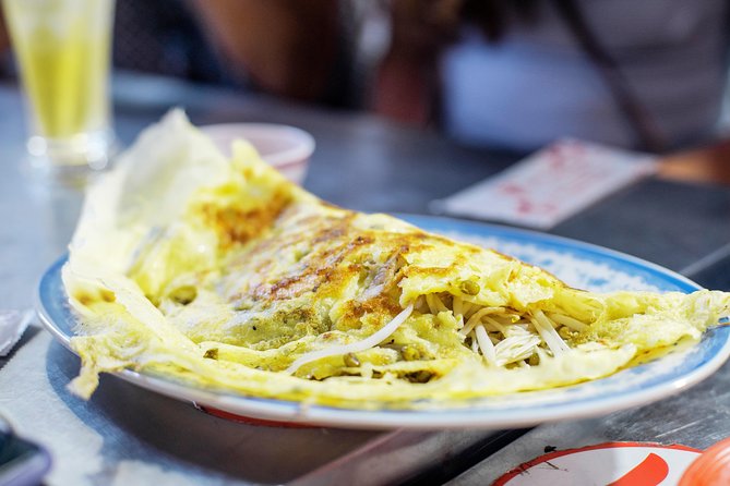 Private Street Food Tour by Scooter in Ho Chi Minh City - The route starts where Saigon crowds gather: Opera House meeting point
