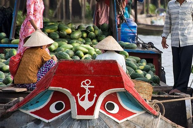 Private Tour Mekong Delta Day Trip from Ho Chi Minh City - Vinh Trang Temple on the River Tien: culture with a view