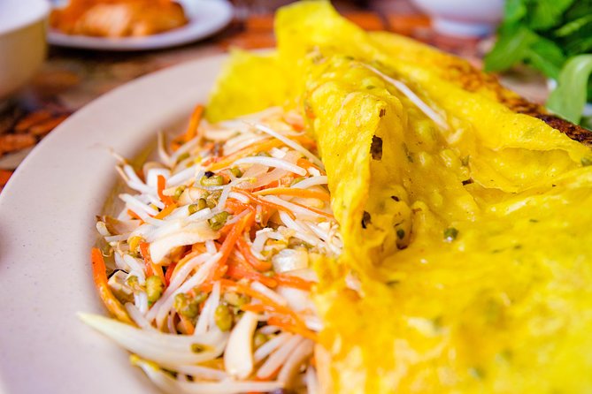 Private Vegan Food Tour By Scooter in Ho Chi Minh City - District 3 kickoff at Street Food Man: the story that sets the mood