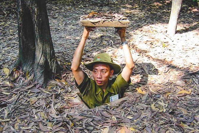 Private War Veteran CuChi Tunnels 1/2 Day Tour - Stop 1 in Ho Chi Minh City: a quick set-up before the real shift