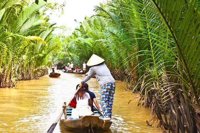 Remarkable Vietnam 14 Days - Hanoi, Sapa, Halong Bay, Ho Chi Minh - Halong Bay with an overnight cruise: islets, sunset, kayaking, and the slow morning