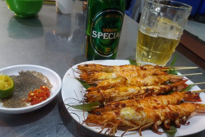 Saigon After Dark and Street Food by Motorbike and Scooter - From flower market to fashion street: Saigon at night between bites