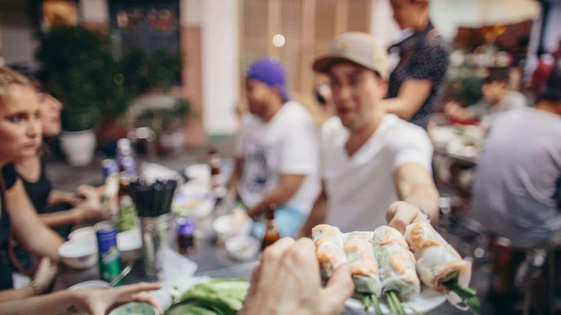 Saigon at Sunset: Ultimate Street Food Experience - Street beer, peanuts, and rice crackers