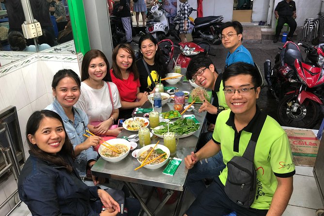 Saigon By Night and Street Food By Motorbike | Opt: Ao Dai Riders - Stop 3: Nguyen Trai Street Shopping Energy (Between Eats)
