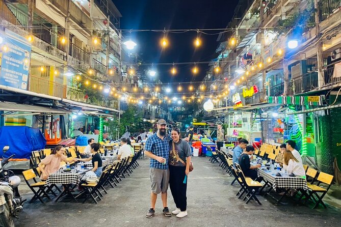 Saigon by Night: Private Street Food Walk You Can’t Miss - District 10 night hits: sugarcane juice, Vietnamese pizza, seafood challenge, and banh mi