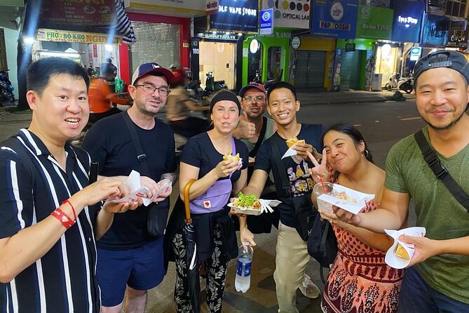 Saigon by Night: Private Street Food Walk You Can’t Miss - District 3 at night: seeing daily life between bites