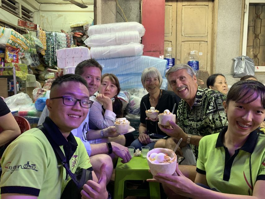 Saigon: City Unseen Highlights 2h Tour | Opt: Ao Dai Riders - Nguyen Hue Walking Street: French facades and modern city life