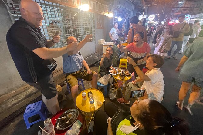 Saigon Night Craft Beer and Street Food By Scooter and motorbike - Stop 3: Ho Thị Kỷ Flower Market Stop (35 Minutes)