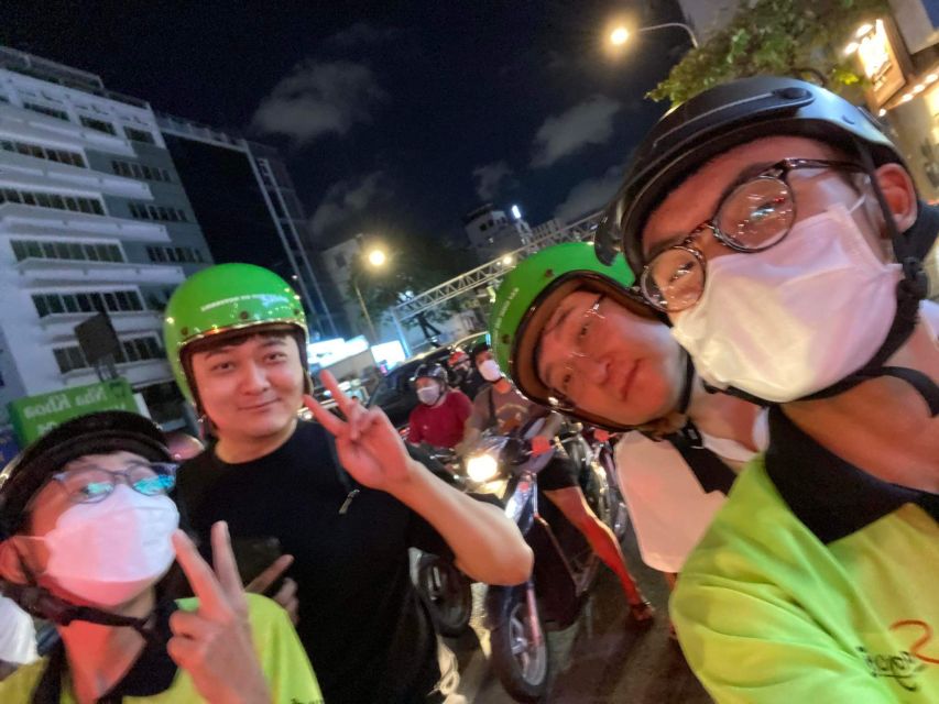 Saigon: Night Sightseeing And Street Food Tour By Vespa - Flower market stop and grilled rice-paper style street food