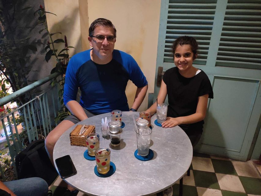 Saigon: Night Sightseeing And Street Food Tour By Vespa - District 5 fashion lanes to District 4 legendary bread